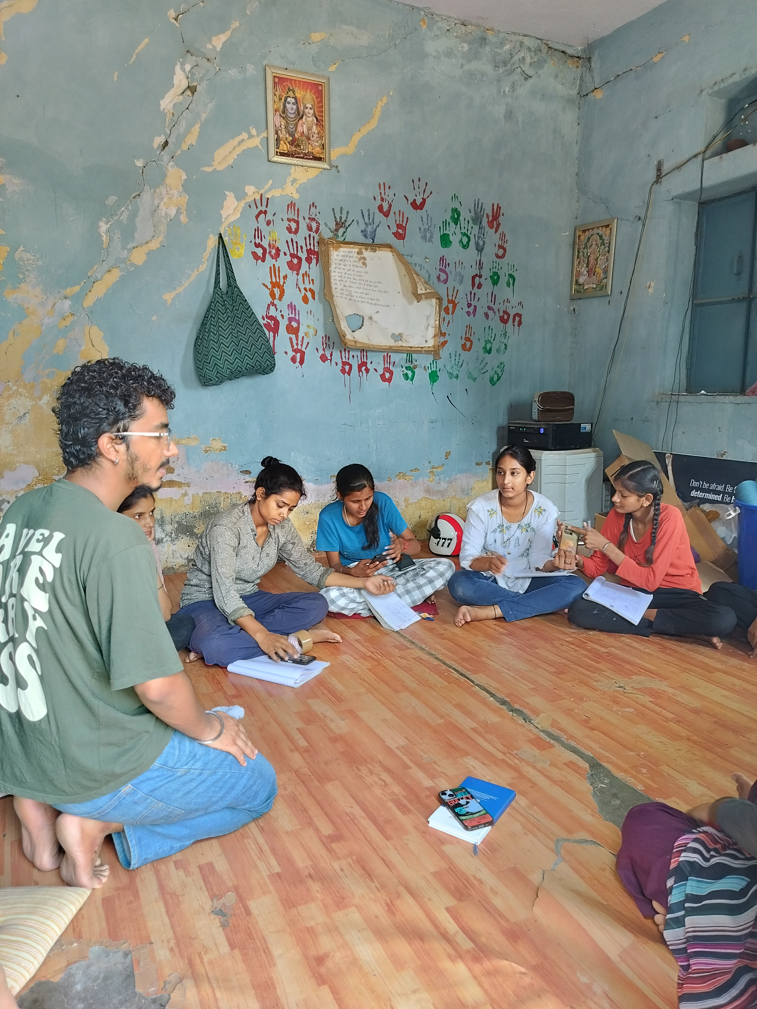 Women learning stitching techniques